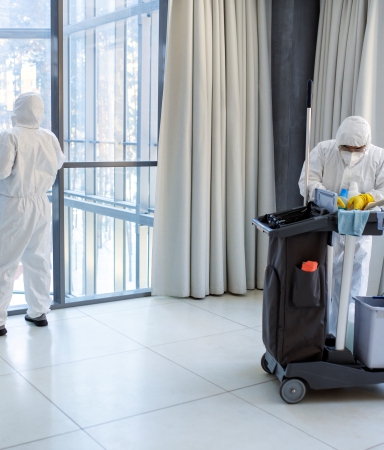 Two cleaners from ACS Commercial Cleaning clean hospital as part of medical cleaning Melbourne services